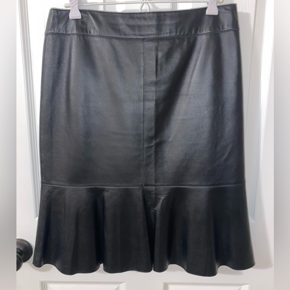 Beautiful pleather lined black skirt size S. Excellent quality! No tags.
